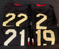 Set of 4 logoed numbered hockey jerseys