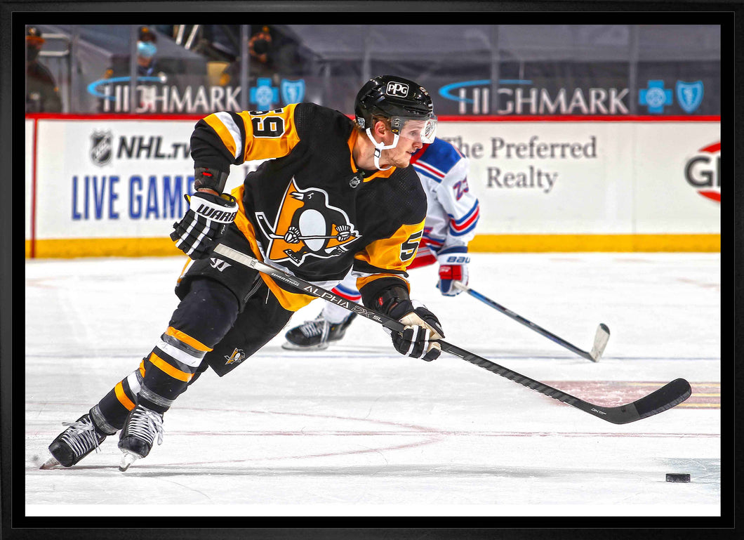 Jake Guentzel Pittsburgh Penguins Framed 20x29 Skating Canvas