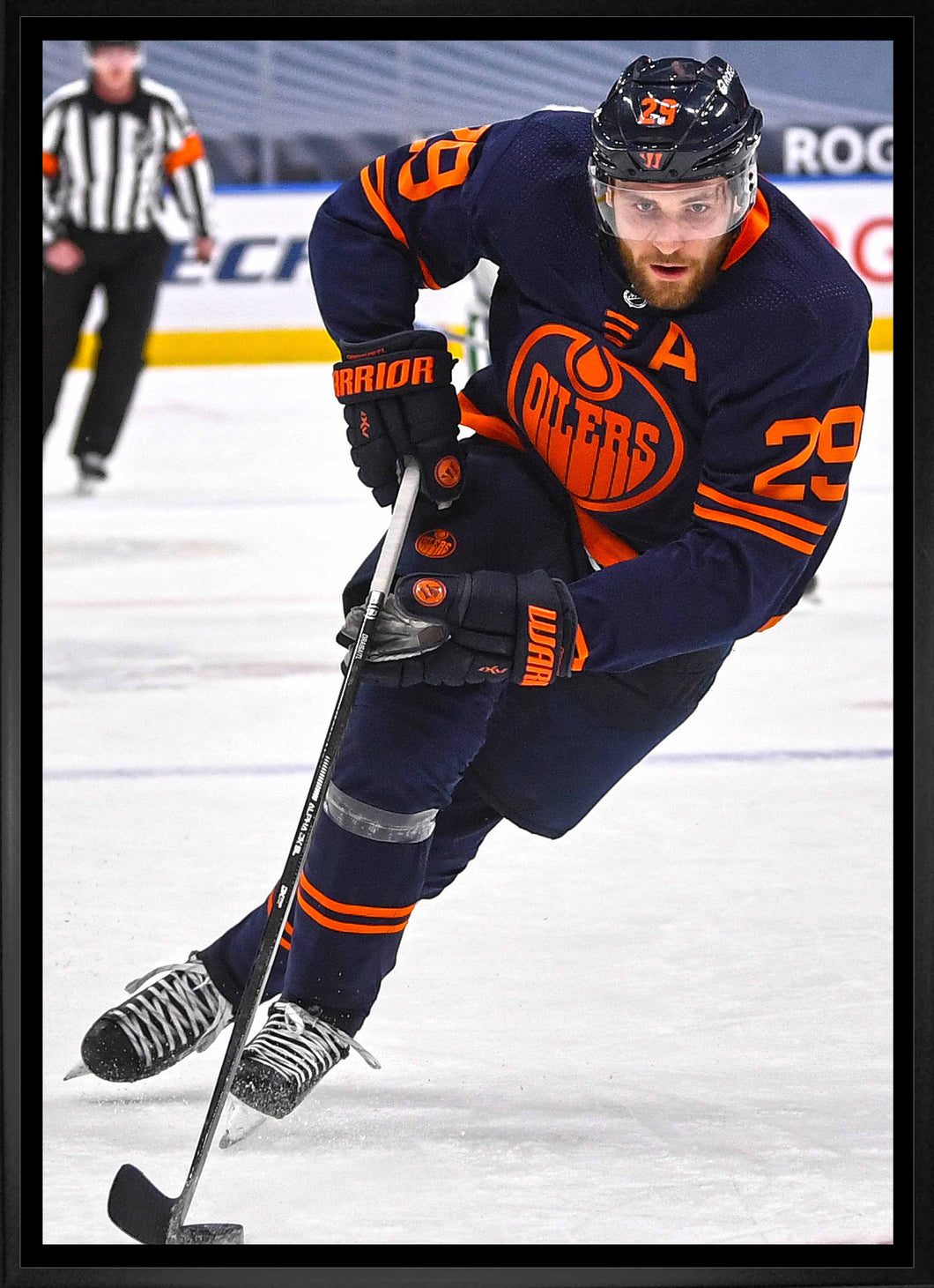 Leon Draisaitl Edmonton Oilers Framed 20x29 Skating with Puck Canvas