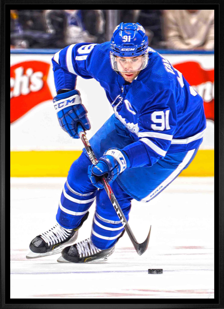 John Tavares Toronto Maple Leafs Framed 20x29 Skating Canvas
