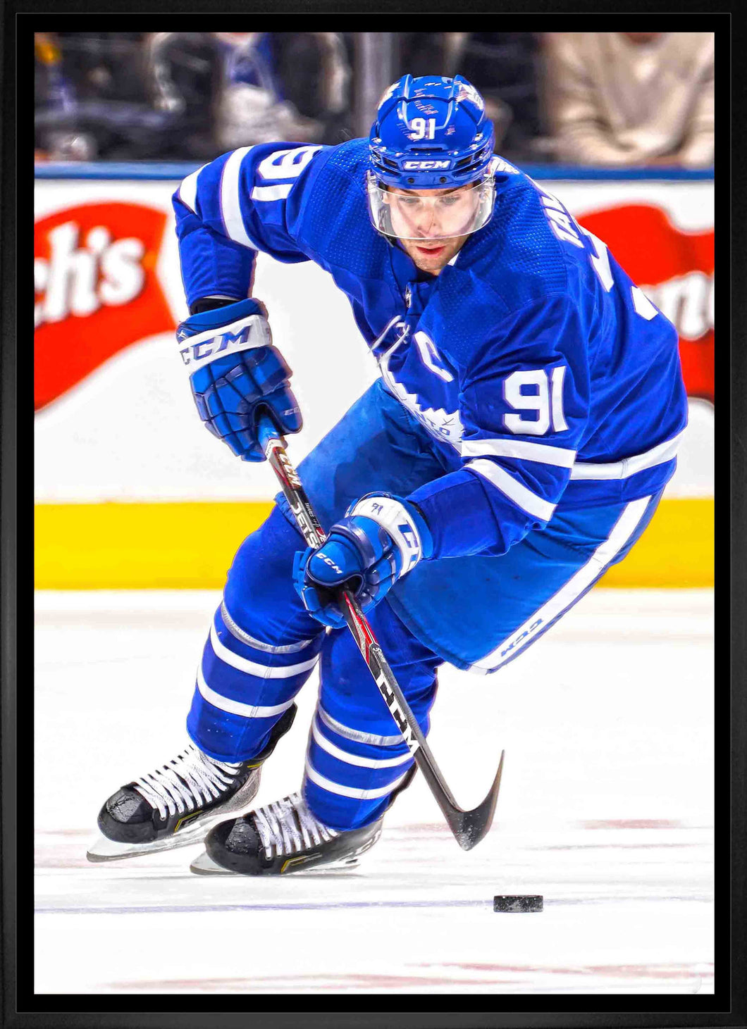 John Tavares Toronto Maple Leafs Framed 20x29 Skating Canvas