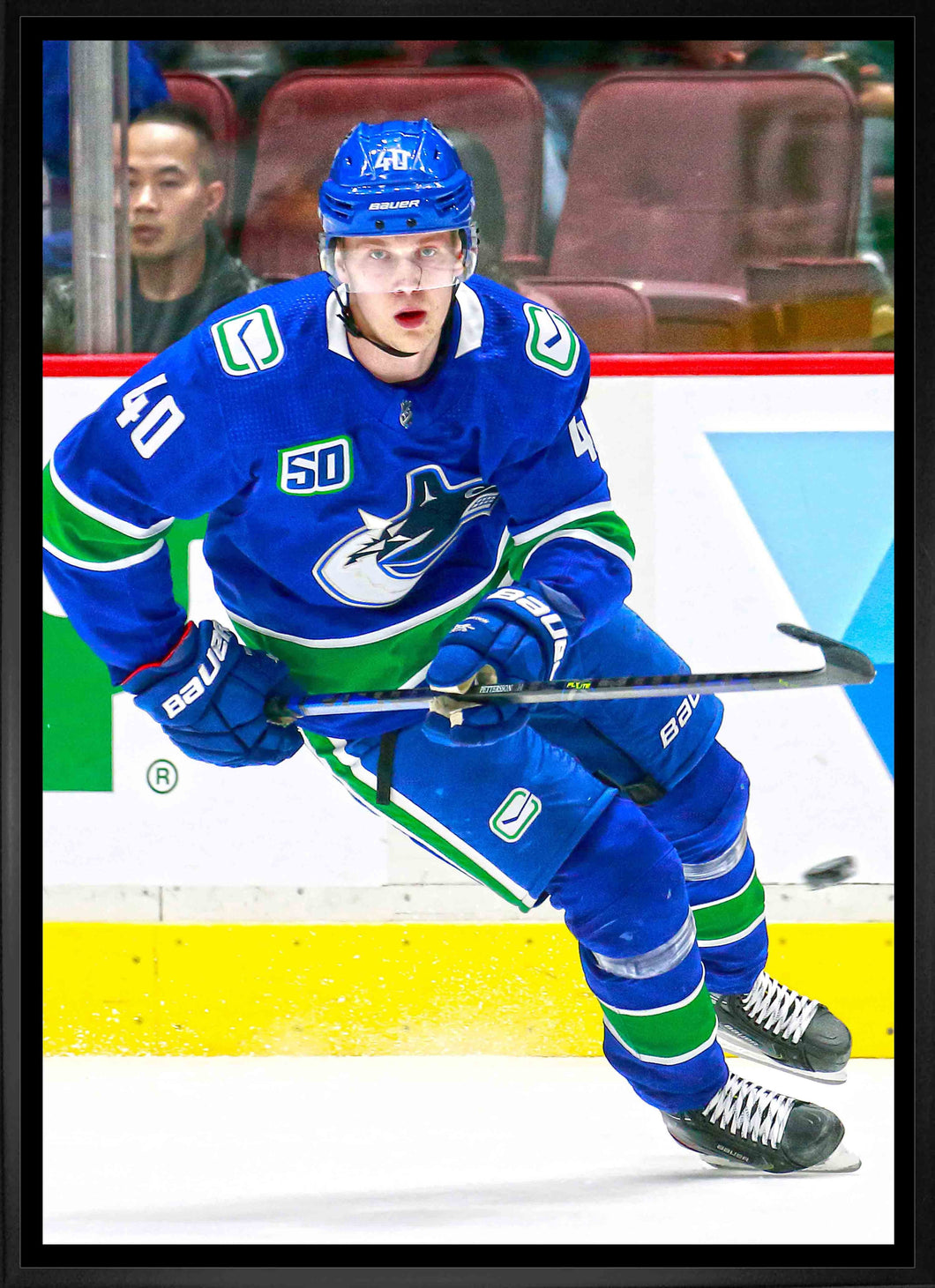 Elias Pettersson Vancouver Canucks Framed 20x29 Skating Canvas