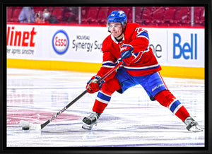 Cole Caufield Montreal Canadiens Framed 20x29 Passing Puck Canvas