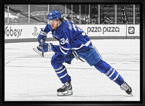 Auston Matthews Toronto Maple Leafs Framed 20x29 Hustling Spotlight Canvas
