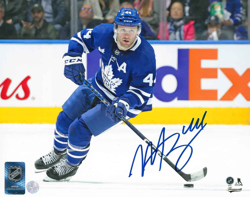 Morgan Rielly Signed Toronto Maple Leafs Blue Skating With Puck 8x10 Photo